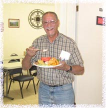 Photo: Man enjoying buffet